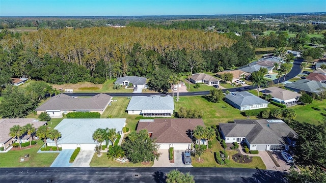 29417 Caddyshack Ln, San Antonio, FL 33576 - aerial overview of property's location with nearby suburban area and a heavily wooded area