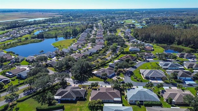 29417 Caddyshack Ln, San Antonio, FL 33576 - aerial view of property and surrounding area with a nearby body of water and nearby suburban area