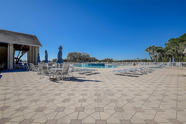 29417 Caddyshack Ln, San Antonio, FL 33576 - community pool with a patio