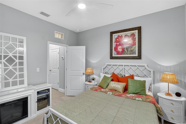 5657 Hawks Cay St, Apollo Beach, FL 33572 - bedroom featuring ceiling fan and light tile patterned floors