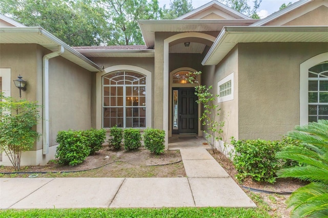 228 Taylor Bay Ln, Brandon, FL 33510 - doorway to property featuring stucco siding