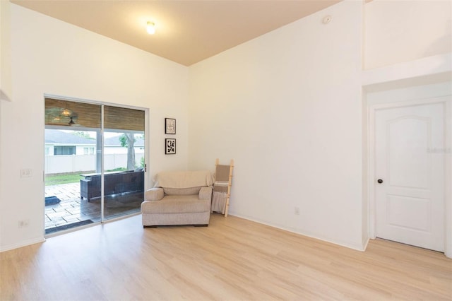 228 Taylor Bay Ln, Brandon, FL 33510 - sitting room featuring light wood-style flooring and a high ceiling