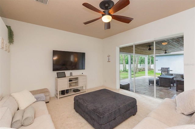228 Taylor Bay Ln, Brandon, FL 33510 - living room with a ceiling fan and carpet