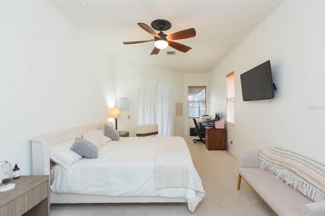228 Taylor Bay Ln, Brandon, FL 33510 - bedroom with light colored carpet, a desk, ceiling fan, and vaulted ceiling