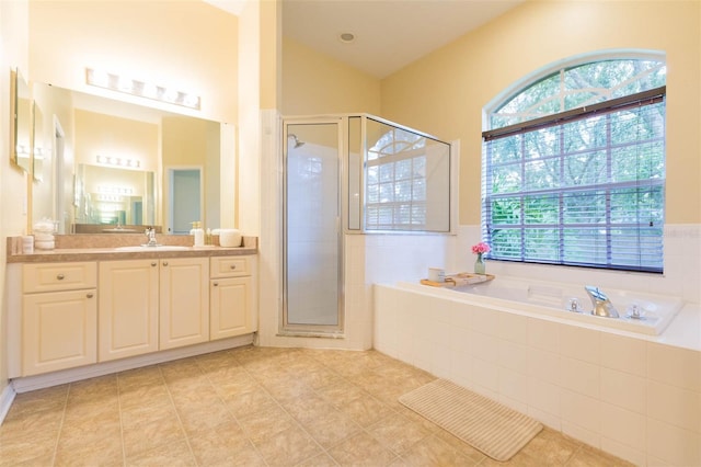 228 Taylor Bay Ln, Brandon, FL 33510 - full bathroom with vanity, a garden tub, a stall shower, and tile patterned flooring