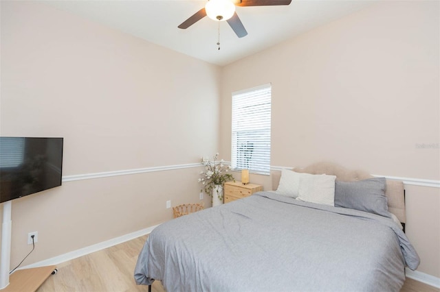228 Taylor Bay Ln, Brandon, FL 33510 - bedroom with wood finished floors and a ceiling fan