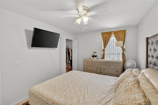 13040 Waterbourne Dr, Gibsonton, FL 33534 - bedroom with a textured ceiling and a ceiling fan