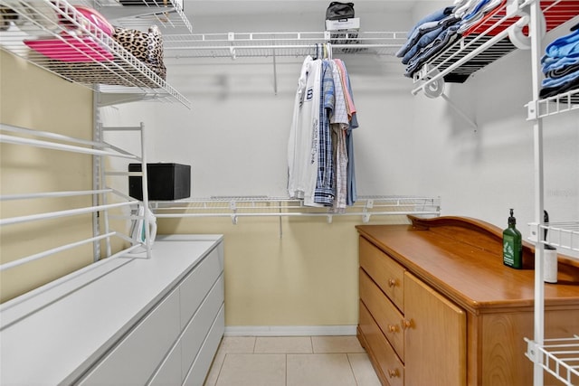 13040 Waterbourne Dr, Gibsonton, FL 33534 - walk in closet with light tile patterned floors