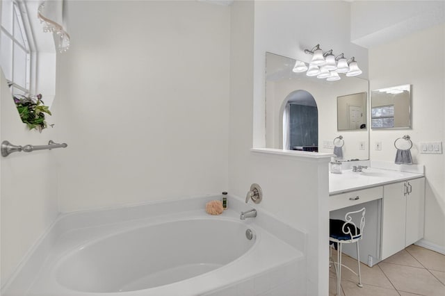 13040 Waterbourne Dr, Gibsonton, FL 33534 - full bathroom with a bath, vanity, and tile patterned flooring