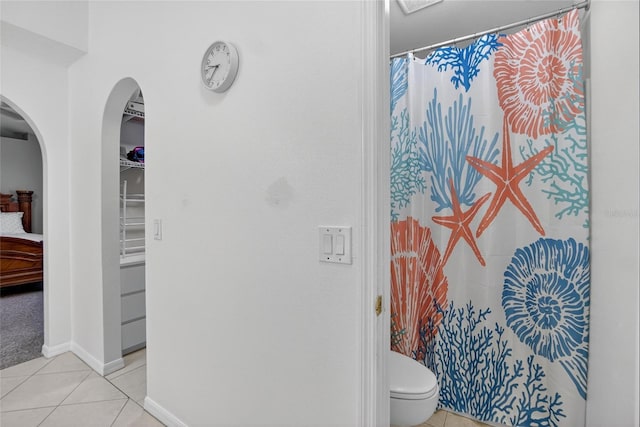 13040 Waterbourne Dr, Gibsonton, FL 33534 - bathroom featuring tile patterned floors and a shower with shower curtain