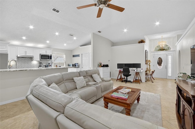 13040 Waterbourne Dr, Gibsonton, FL 33534 - living area with ceiling fan, recessed lighting, lofted ceiling, light tile patterned flooring, and an office area