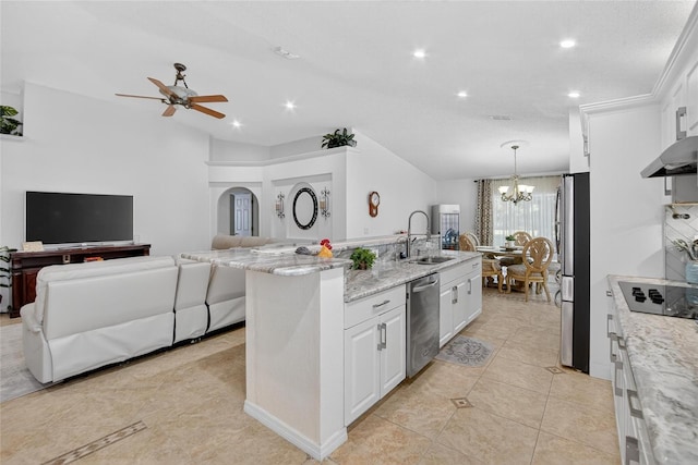 13040 Waterbourne Dr, Gibsonton, FL 33534 - kitchen with appliances with stainless steel finishes, a chandelier, white cabinetry, light stone counters, and recessed lighting