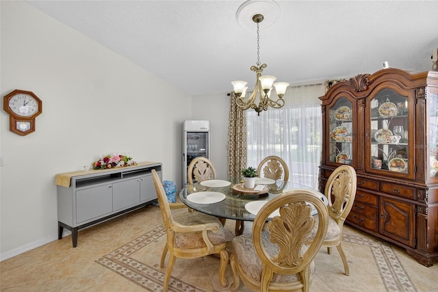 13040 Waterbourne Dr, Gibsonton, FL 33534 - dining area featuring a chandelier and baseboards