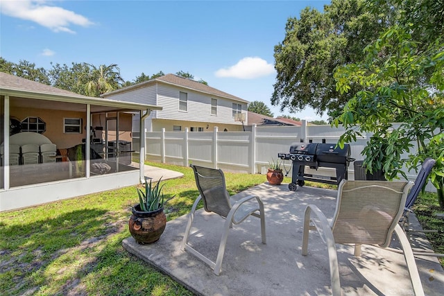 13040 Waterbourne Dr, Gibsonton, FL 33534 - view of patio featuring a sunroom and a grill