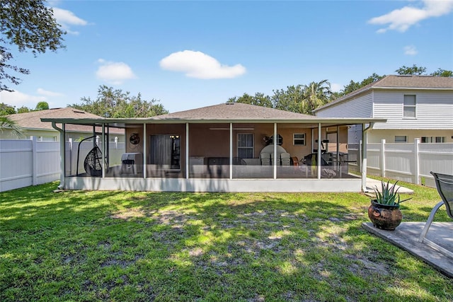 13040 Waterbourne Dr, Gibsonton, FL 33534 - rear view of property featuring a sunroom