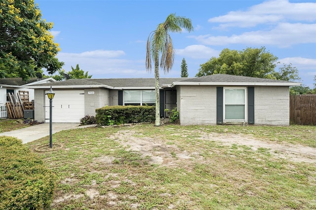 7510 Tyson Dr, Port Richey, FL 34668 - single story home featuring a garage, driveway, and brick siding
