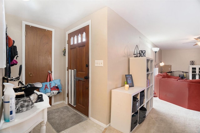 7510 Tyson Dr, Port Richey, FL 34668 - entryway with baseboards and a ceiling fan