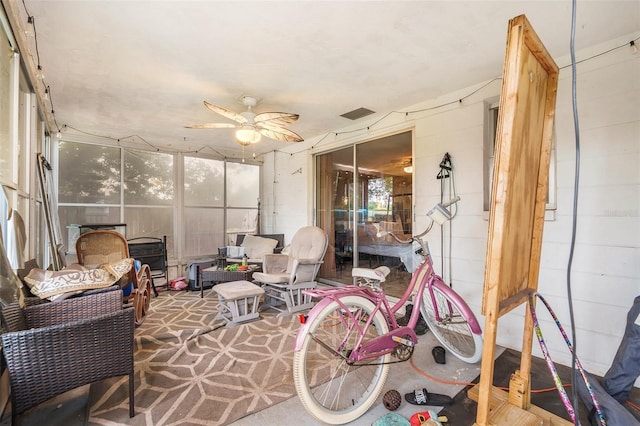 7510 Tyson Dr, Port Richey, FL 34668 - sunroom / solarium featuring ceiling fan, outdoor lounge area, and healthy amount of natural light