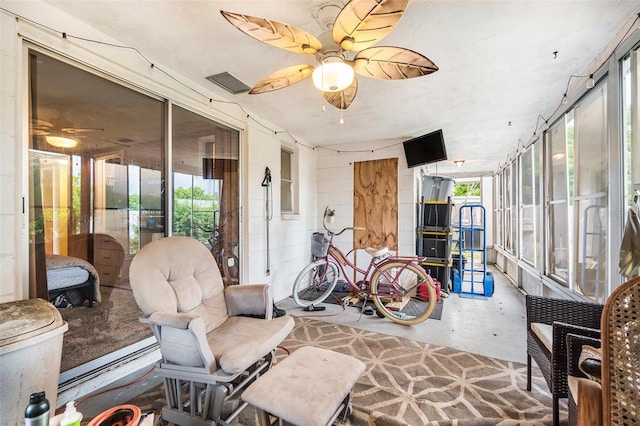 7510 Tyson Dr, Port Richey, FL 34668 - sunroom / solarium featuring ceiling fan and healthy amount of natural light