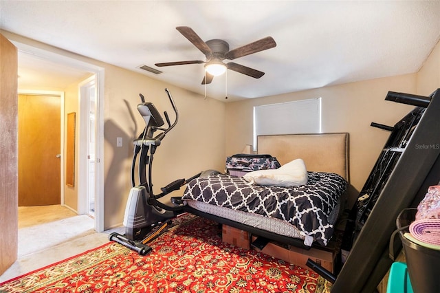7510 Tyson Dr, Port Richey, FL 34668 - carpeted bedroom with ceiling fan and baseboards