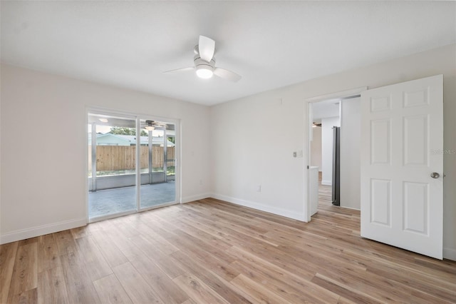 4236 Woodtrail Blvd, New Port Richey, FL 34653 - empty room with ceiling fan and light wood-style floors