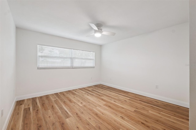 4236 Woodtrail Blvd, New Port Richey, FL 34653 - spare room featuring ceiling fan and light wood-style flooring