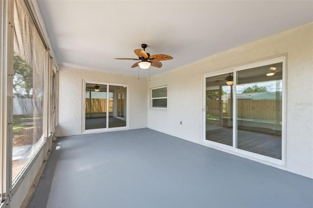 4236 Woodtrail Blvd, New Port Richey, FL 34653 - unfurnished sunroom with ceiling fan