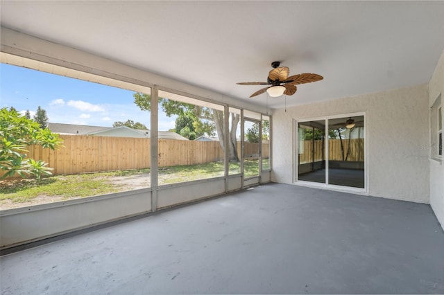 4236 Woodtrail Blvd, New Port Richey, FL 34653 - unfurnished sunroom featuring ceiling fan
