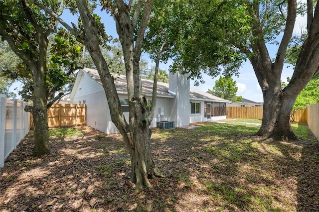 4236 Woodtrail Blvd, New Port Richey, FL 34653 - back of property with a fenced backyard