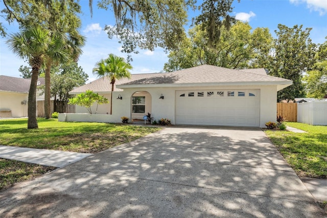 4236 Woodtrail Blvd, New Port Richey, FL 34653 - single story home featuring concrete driveway, stucco siding, and a garage