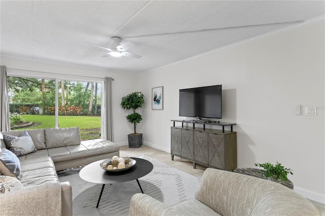 3325 Bayshore Blvd Unit E14, Tampa, FL 33629 - living area featuring ceiling fan, a textured ceiling, crown molding, and light tile patterned flooring