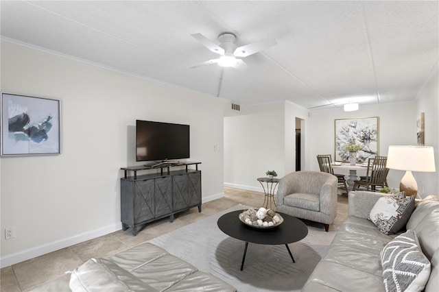 3325 Bayshore Blvd Unit E14, Tampa, FL 33629 - living area with light tile patterned flooring, ornamental molding, and a ceiling fan