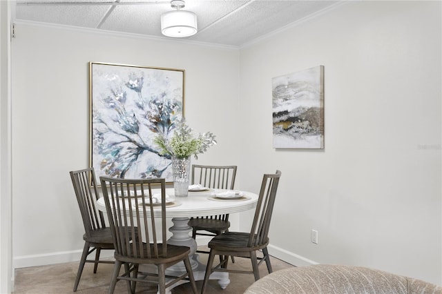 3325 Bayshore Blvd Unit E14, Tampa, FL 33629 - dining room featuring crown molding