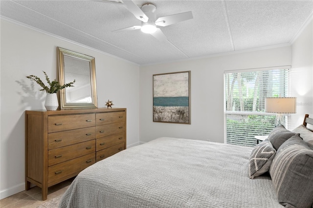 3325 Bayshore Blvd Unit E14, Tampa, FL 33629 - bedroom featuring crown molding, a textured ceiling, and ceiling fan