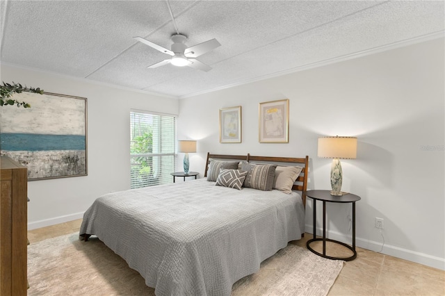 3325 Bayshore Blvd Unit E14, Tampa, FL 33629 - bedroom featuring a textured ceiling, ornamental molding, ceiling fan, and tile patterned floors