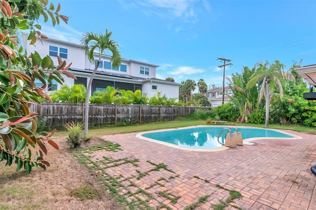 5101 W Neptune Way, Tampa, FL 33609 - view of pool featuring a patio and a fenced backyard