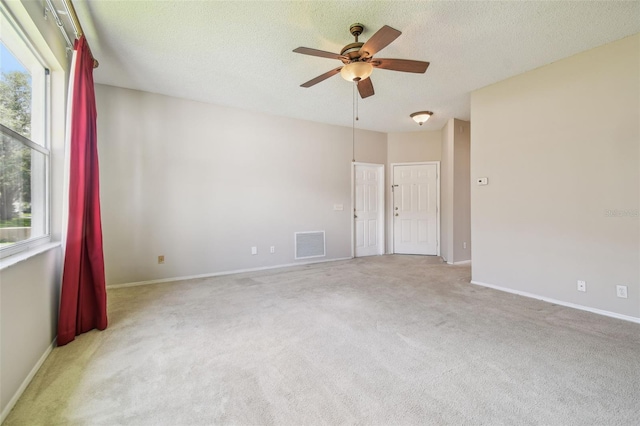 501 Royal Ridge St, Valrico, FL 33594 - carpeted empty room featuring a ceiling fan and a textured ceiling