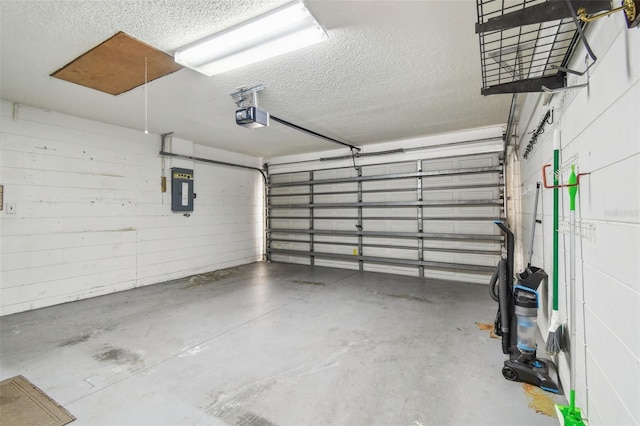 501 Royal Ridge St, Valrico, FL 33594 - garage featuring a garage door opener and electric panel