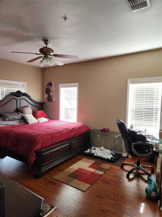 3713 Conroy Rd Unit 1922, Orlando, FL 32839 - bedroom featuring wood finished floors, an office area, and ceiling fan