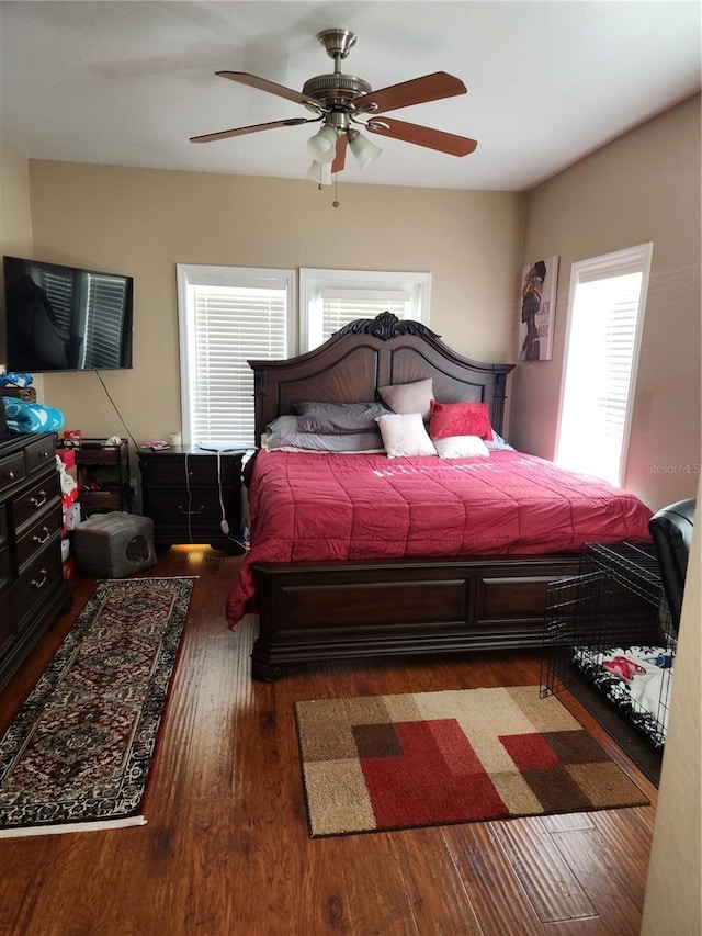 3713 Conroy Rd Unit 1922, Orlando, FL 32839 - bedroom with wood finished floors, multiple windows, and ceiling fan