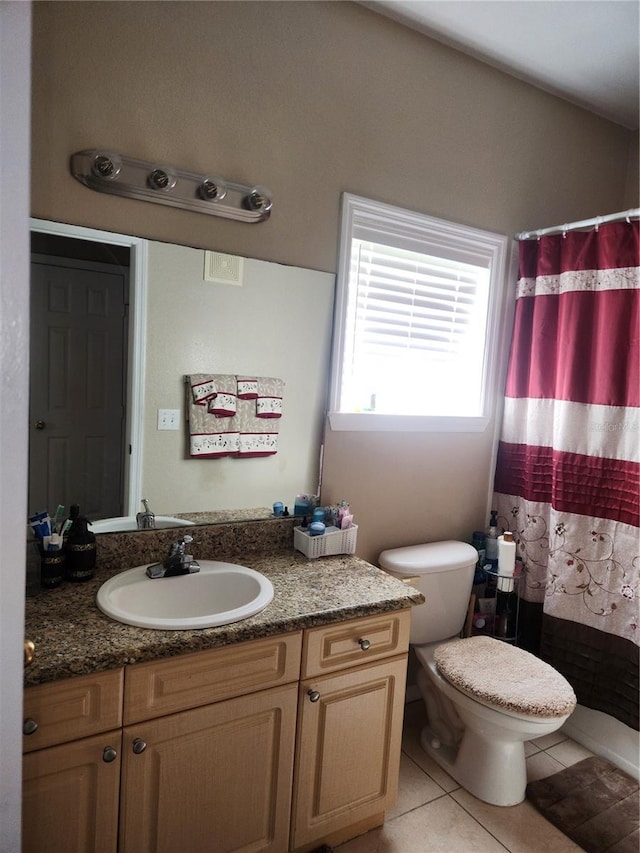 3713 Conroy Rd Unit 1922, Orlando, FL 32839 - full bath with vanity, tile patterned floors, and a shower with curtain