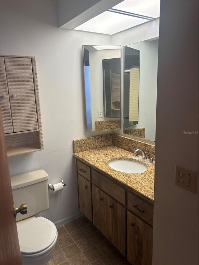 6125 Chesham Dr Unit 1, New Port Richey, FL 34653 - bathroom with vanity and tile patterned flooring