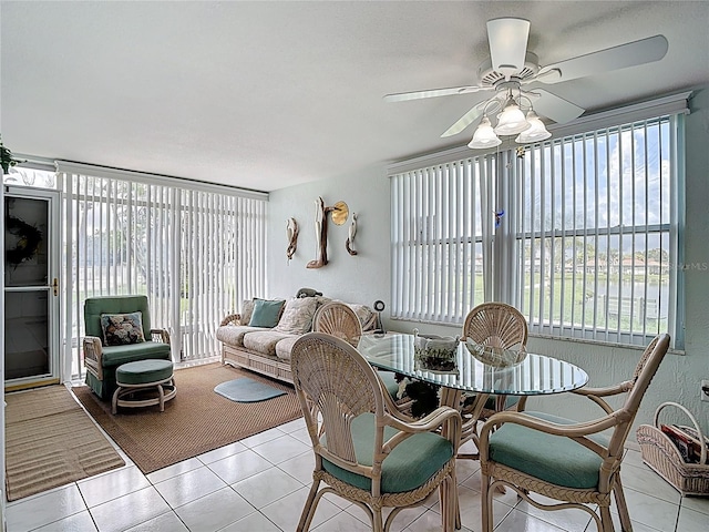 4360 Tahitian Gardens Cir Unit H, Holiday, FL 34691 - dining space with ceiling fan and light tile patterned floors