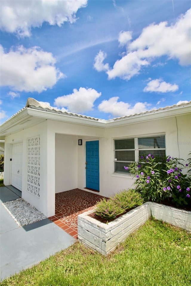 3643 Mainlands Blvd N, Pinellas Park, FL 33782 - property entrance with stucco siding