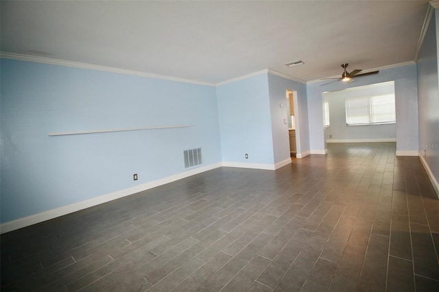 3643 Mainlands Blvd N, Pinellas Park, FL 33782 - spare room featuring ceiling fan, ornamental molding, and dark wood-style floors