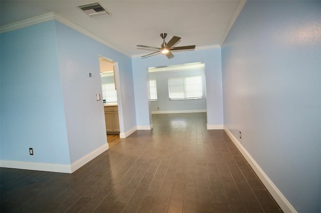 3643 Mainlands Blvd N, Pinellas Park, FL 33782 - unfurnished room featuring a ceiling fan, dark wood-style flooring, and crown molding