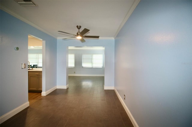 3643 Mainlands Blvd N, Pinellas Park, FL 33782 - hall featuring crown molding, dark wood-style floors, and plenty of natural light