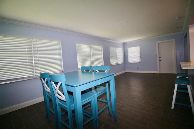 3643 Mainlands Blvd N, Pinellas Park, FL 33782 - dining area with ornamental molding and wood finished floors