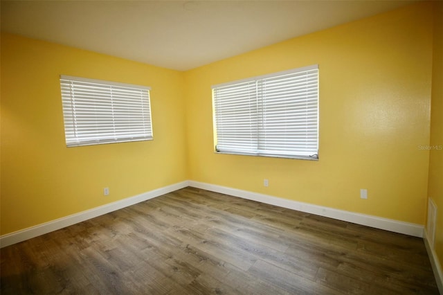 3643 Mainlands Blvd N, Pinellas Park, FL 33782 - unfurnished room with wood finished floors and baseboards