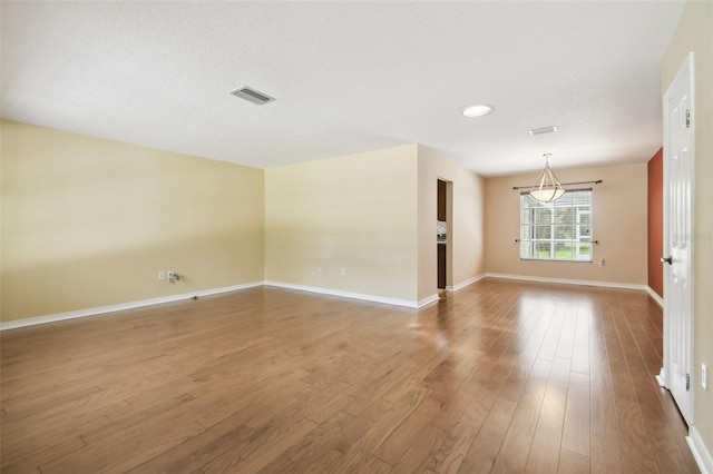 4514 John Moore Rd, Brandon, FL 33511 - spare room with wood finished floors and baseboards